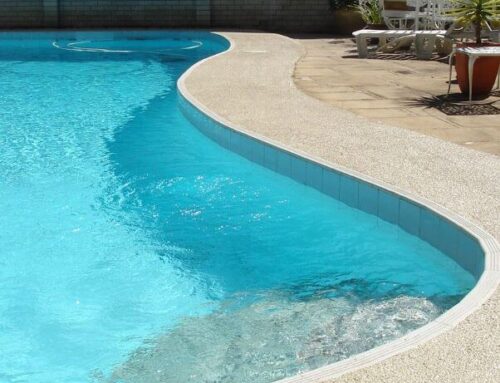 Domestic pool coping is painted with LUXAPOOL® Poolside and Paving in Merino colour