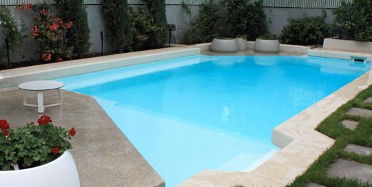 Resort pool painted with Luxapool epoxy white