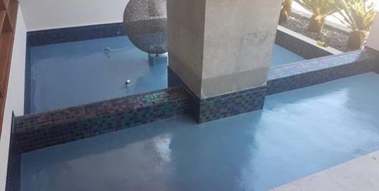 Residential fountain painted with Luxapool platinum blue