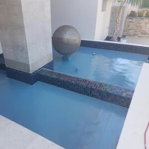 Residential fountain painted with Luxapool platinum blue