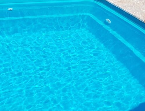 Residential pool painted in LUXAPOOL Epoxy Turquoise colour by DIYer Timothy Grant with the water in
