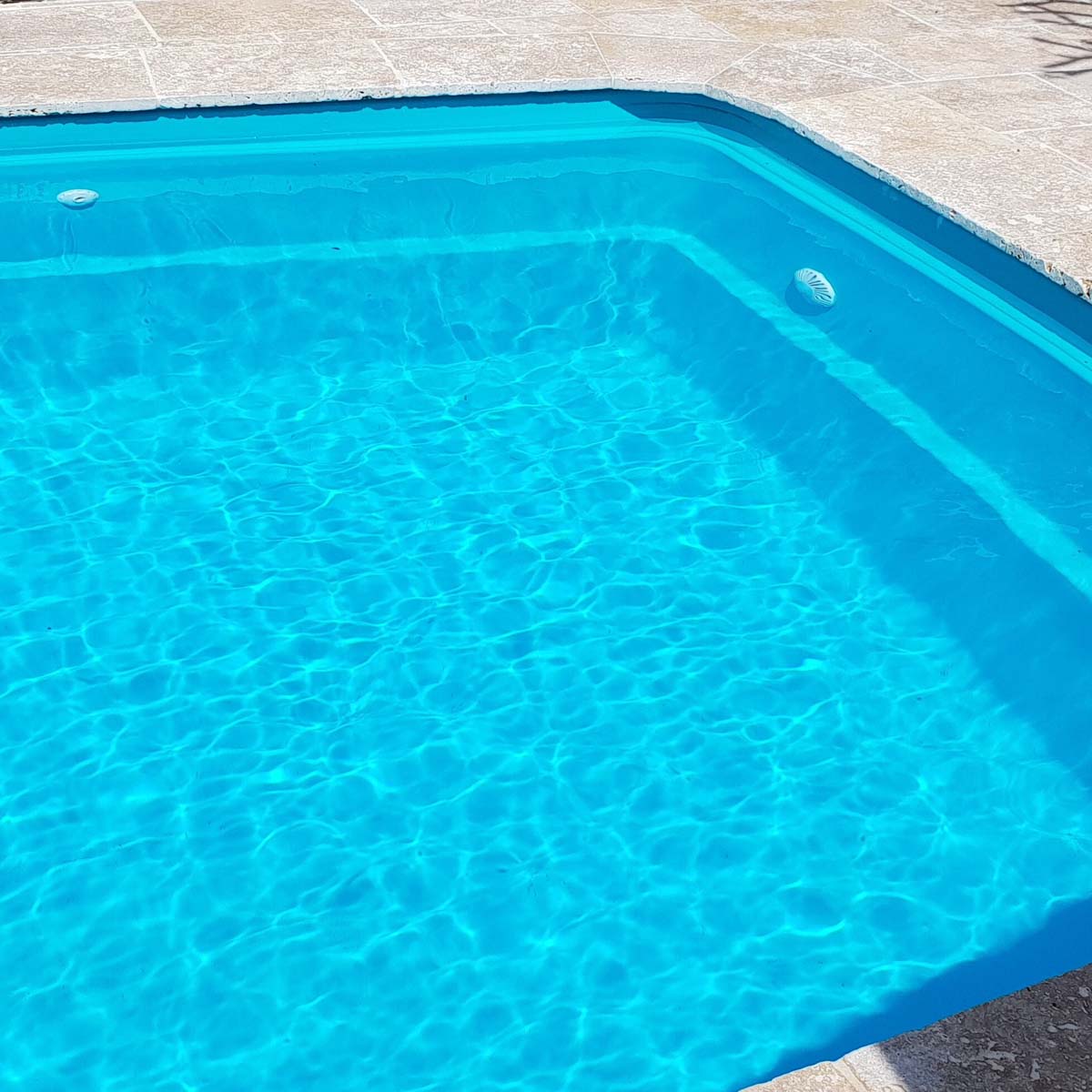 Residential pool painted in LUXAPOOL Epoxy Turquoise_colour by DIYer Timothy Grant with the water in