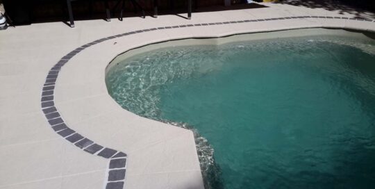 Poolside resurfaced with LUXAPOOL poolside and paving in Merino 