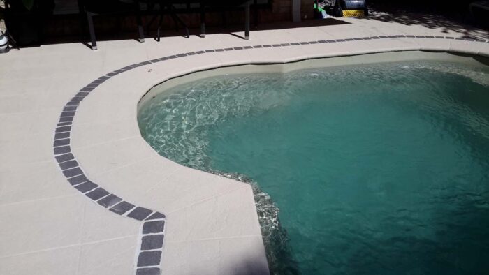 Poolside resurfaced with LUXAPOOL poolside and paving in Merino 