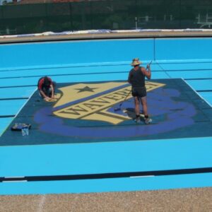 Waverley College Pool painted with LUXAPOOL Epoxy Adriatic and specialty colours on the school crest 